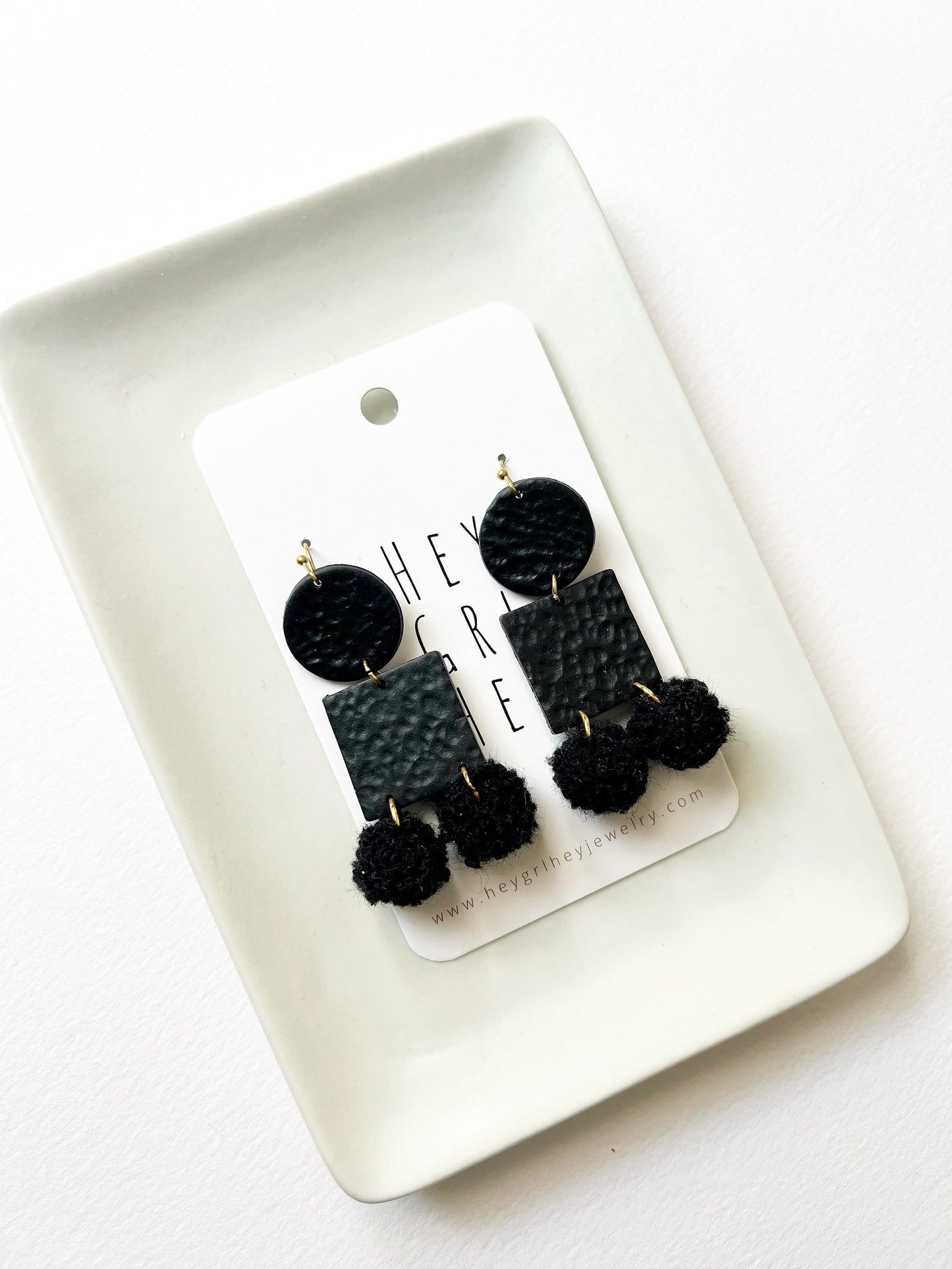 The Black Pom Pom Earrings