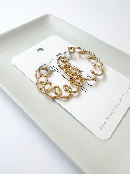 The Spiral Hoop Earrings