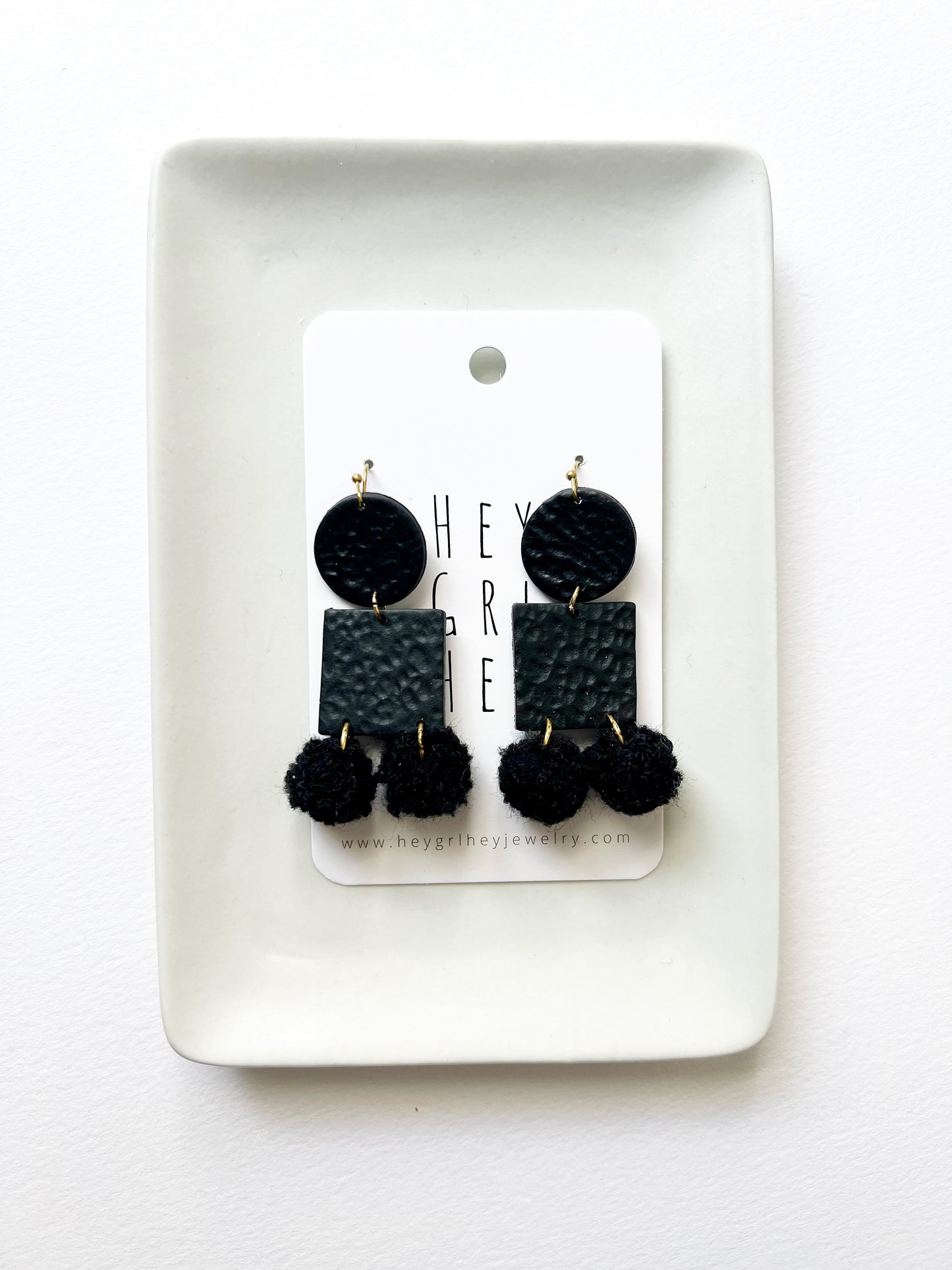 The Black Pom Pom Earrings