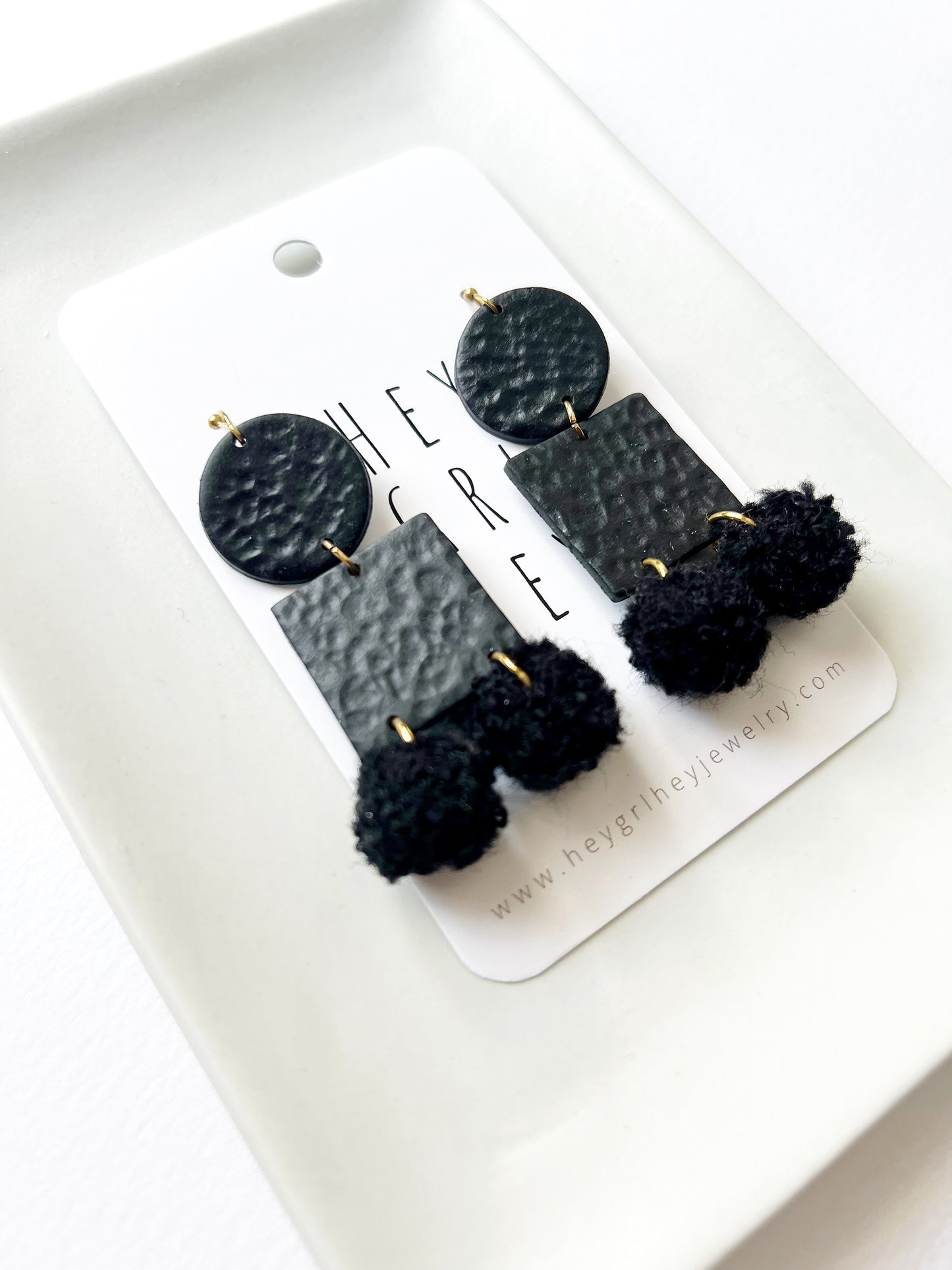 The Black Pom Pom Earrings